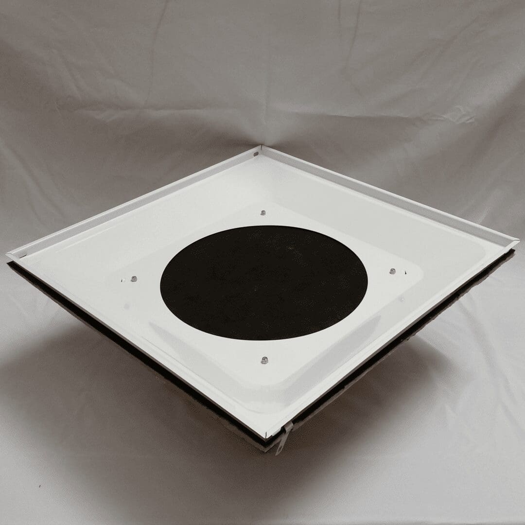 The Universal Start Collar Back Pan is a square white panel with a central black circle and four small white protrusions at the corners, set against a plain background.