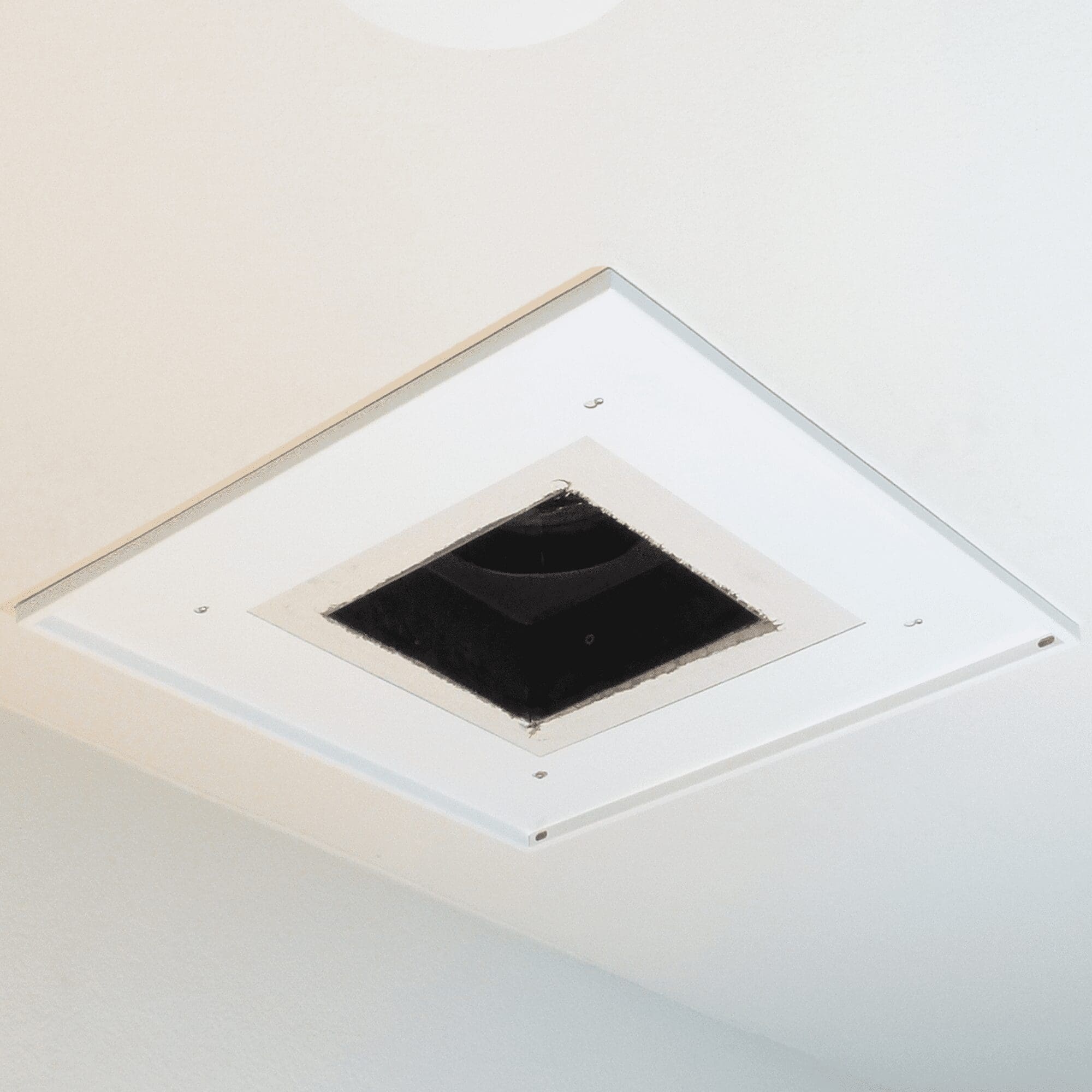 Surface Mount Backpan CFFD 77120 set in a white ceiling with an open duct.