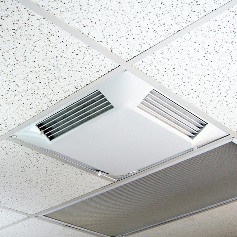 Ceiling with a Comfort First Filtered Diffuser, featuring a square white air vent panel next to tiled ceiling panels.